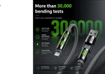 A black and gray USB-C charging cable with bright green accents on the connectors, shown against a dark promotional background with text highlighting durability and charging speed.